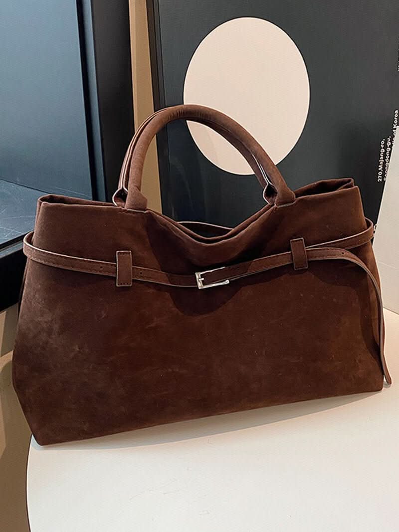 Handtasche mit Überschlag und Henkeln