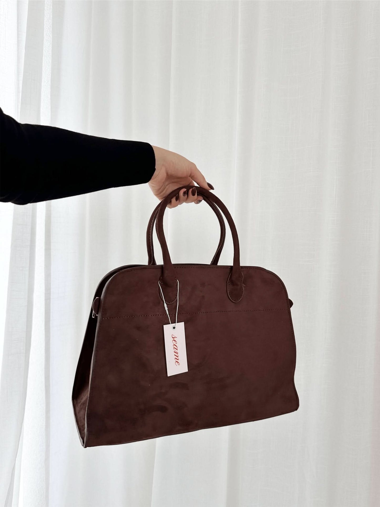Große Handtasche mit Henkeln und Struktur-Oberfläche