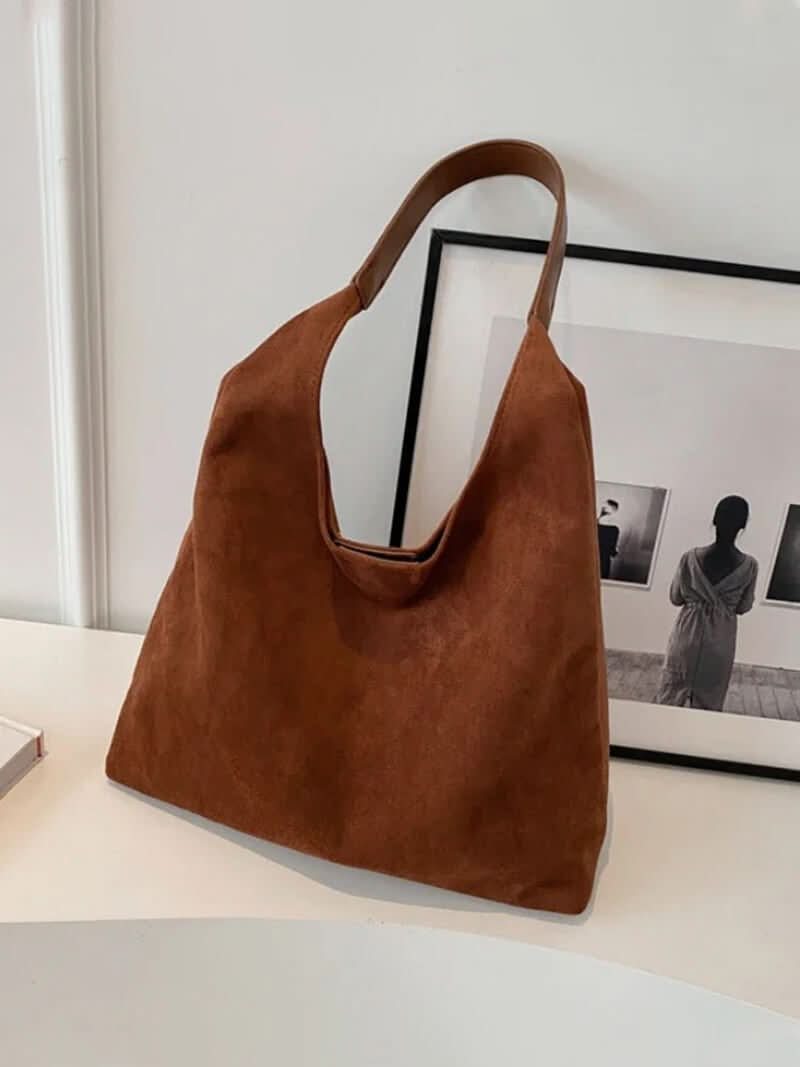 Schultertasche mit schlichtem Design und großem Hauptfach