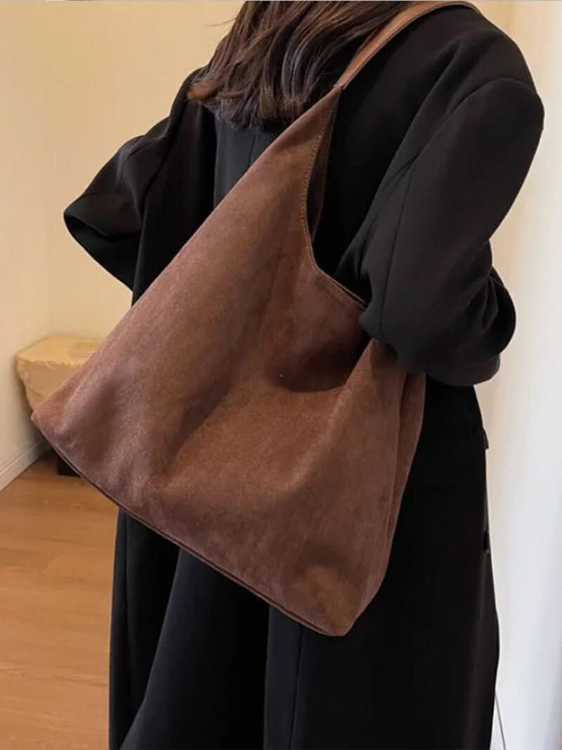 Schultertasche mit schlichtem Design und großem Hauptfach