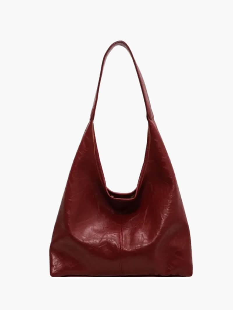 Weiche Schultertasche mit breitem Trageriemen